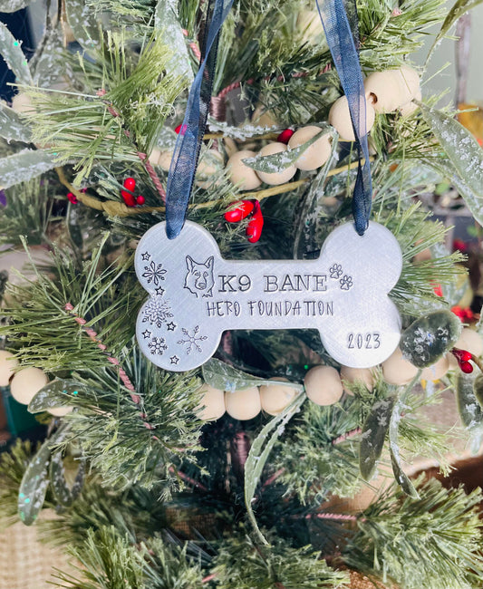 K9 Bane hand stamped dog bone ornament. This ornament will shine bright on your tree this holiday season.